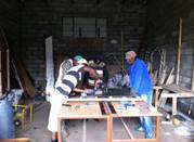 Volunteers working at the workshop